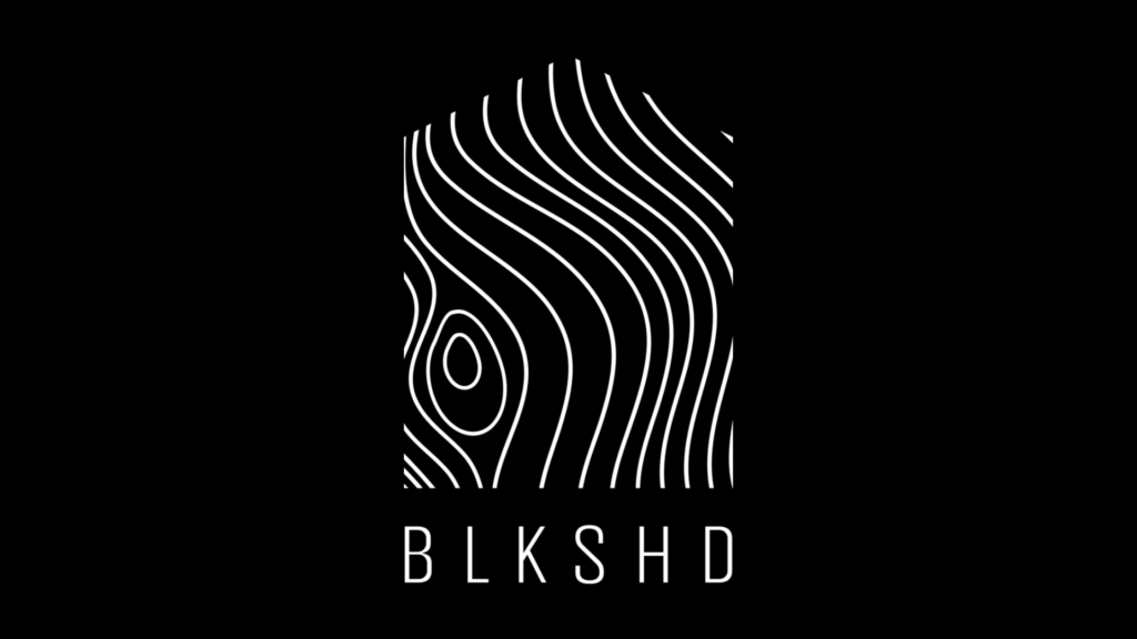 Black Shed BLK SHD White logo on black background